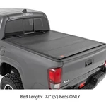 Rough Country Hard Tri-fold Flip Up Bed Cover For 16-23 Toyota Tacoma W/ 72" New. Price: $849.95.