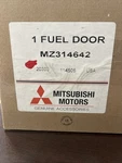 Genuine Mitsubishi Fuel Door Alloy MZ314642 New. Price: $125.00.